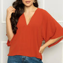 Women's blouse with solid batwing sleeves, good quality dune fabric. (Code 11)