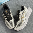 ASICS GEL CUMULUS 25 – CINZA / PRETO / DOURADO