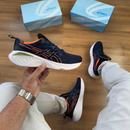 Tênis ASICS Pure Gel Masculino Azul Marinho Laranja