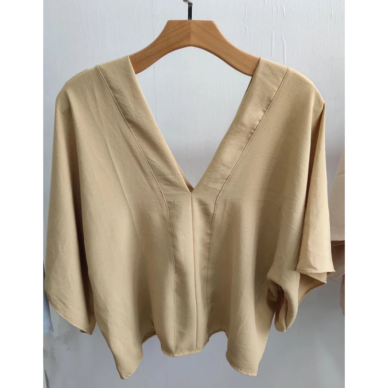 Women's blouse with solid batwing sleeves, good quality dune fabric. (Code 11)