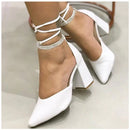 White pumps with rhinestones