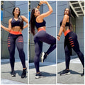 set of detonated leggings plus women's suplex gym training top