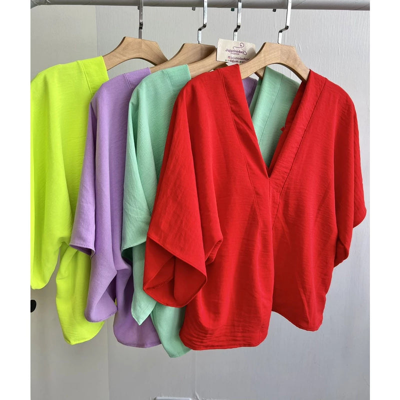 Women's blouse with solid batwing sleeves, good quality dune fabric. (Code 11)